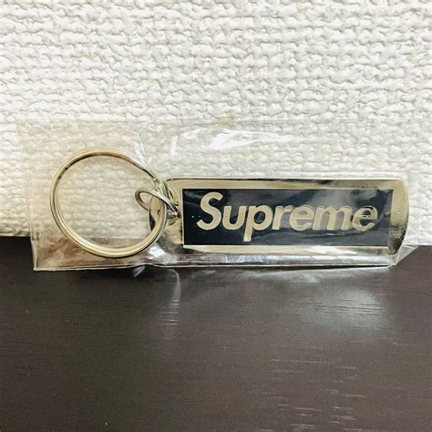 supreme14ss unhs metal tag box logo black polished keychain|Supreme Metal Tag Keychain Black .